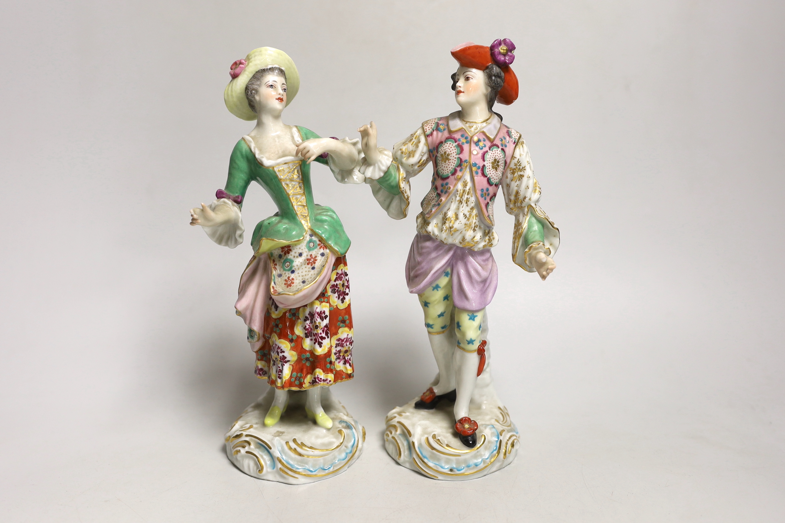 A pair of Continental porcelain figures, 23cm high